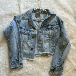 Distressed cropped denim jacket